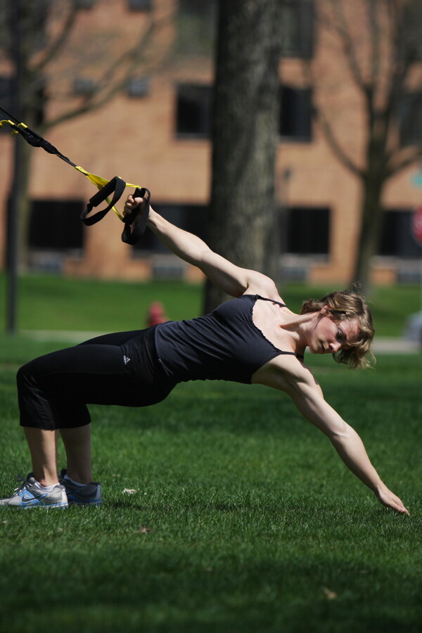 Cheri demonstrates the cliffhanger or power pull exercise.