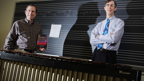 THEY’VE GOT RHOMBOIDS, THEY’VE GOT MUSIC. UW-Eau Claire math professor James Walker, left, and music professor Gary Don collaborated to write a newly published textbook, Mathematics and Music: Composition, Perception, and Performance. 