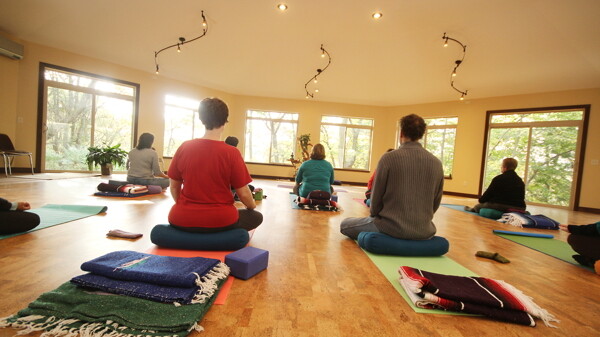 The Center offers space for wellness and creative classes of all sorts, including yoga (held in a new sunroom).
