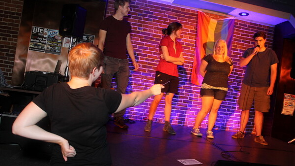 POINTED COMMENTARY. The Backwards Thinkers Society, UW-Eau Claire’s improv troupe, performed Aug. 1 at The Plus as part of the Big Gay Variety Show, a fundraiser for the Chippewa Valley LGBT Community Center.