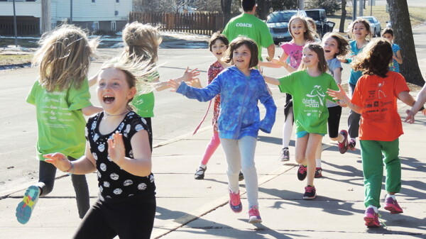 HIGH FIVES ALL AROUND. More than 1,000 third- through fifth-grade girls from local schools have taken part in the Girls on the Run of Eau Claire Country program since its inception in 2006.