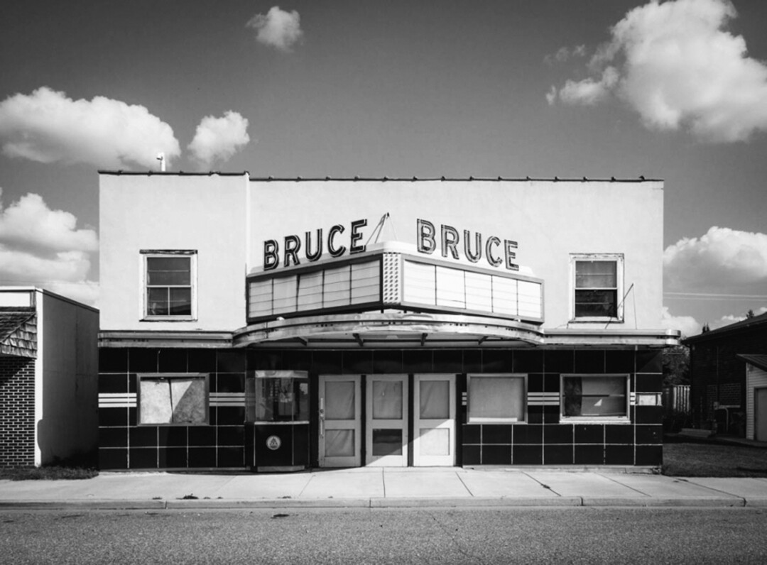 In one of his latest projects, prolific photographer Travis Dewitz is profiling towns up and down the Chippewa River. Above: An abandoned theater in Bruce, Wisconsin.