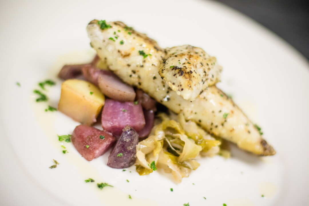 Lake Perch: pan-seared perch with white wine-braised cabbage,  Square Roots Farm heirloom potatoes, and lemon buerre blanc