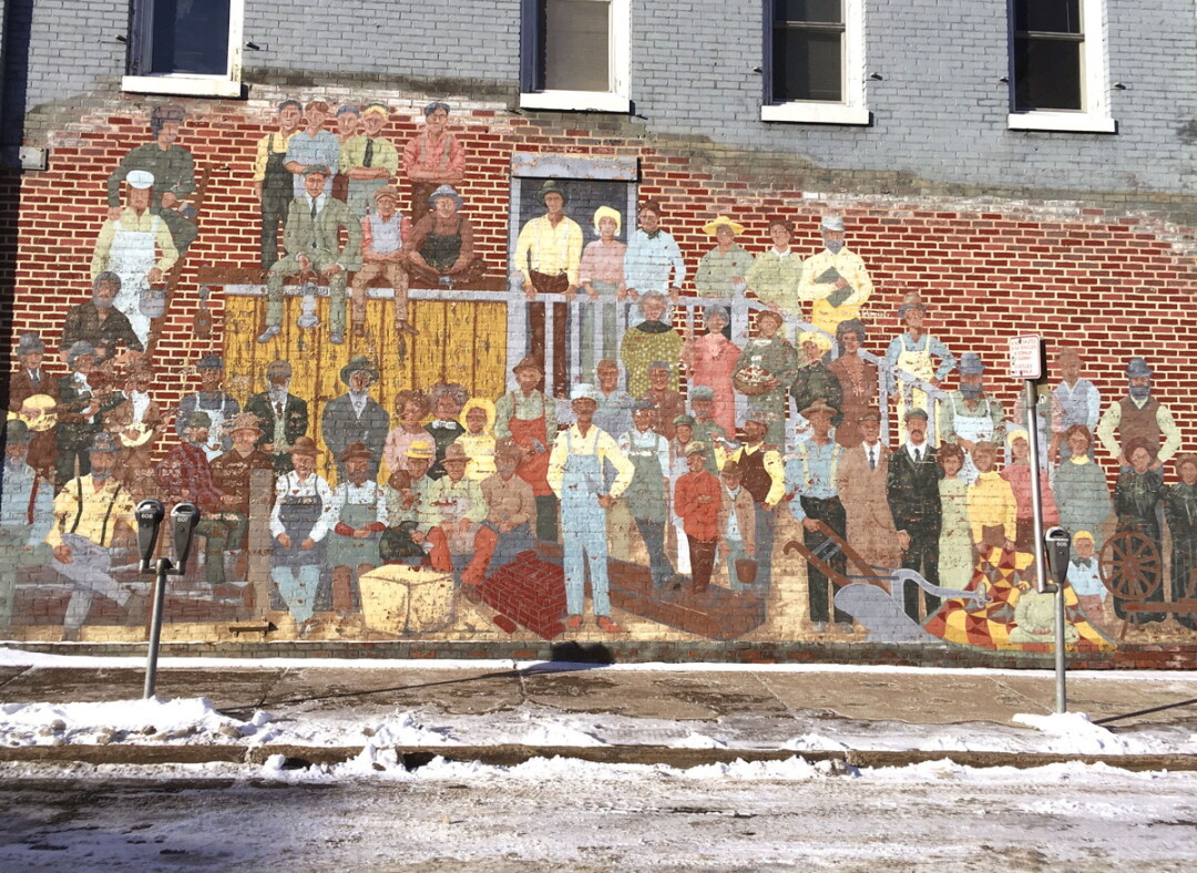 ONE LAST LOOK. The impending demolition of the former Lee Drug building at the corner of Main and Second streets in Menomoie spells the end for this mural based on historic photos of the city. 