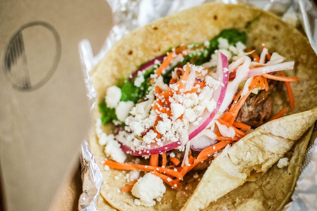 Bomb Tacos of Chippewa Falls serves American-style tacos (lettuce and cheese add-ins), and traditional tacos (pickled veggies, Pico de Gallo, and queso fresco). 