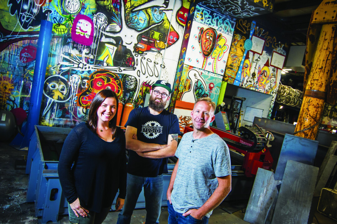 Artisan Forge Studios – a community of artists and makers housed at 1106 Mondovi Road in Eau Claire – will host their Uptown Art Jam on Saturday, Oct. 21 from 9am to 8pm. Above: Facility Director Jackie Boos (left) and owner Greg Johnson (right) are inspired by the “energy of the local art community.”