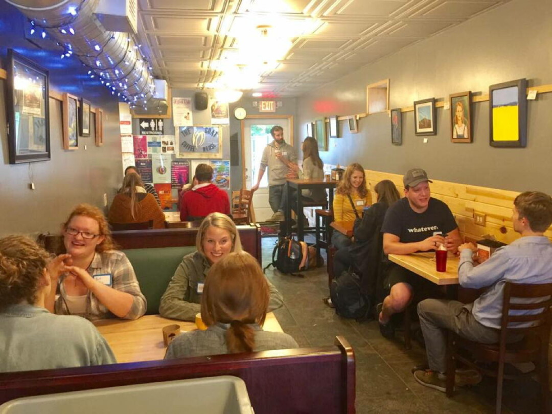 COFFEE AND CONVERSATION. Linguists meet at The Goat Coffeehouse on Water Street in Eau Claire on a Thursday evening to talk, collaborate, and practice English and Spanish languages.