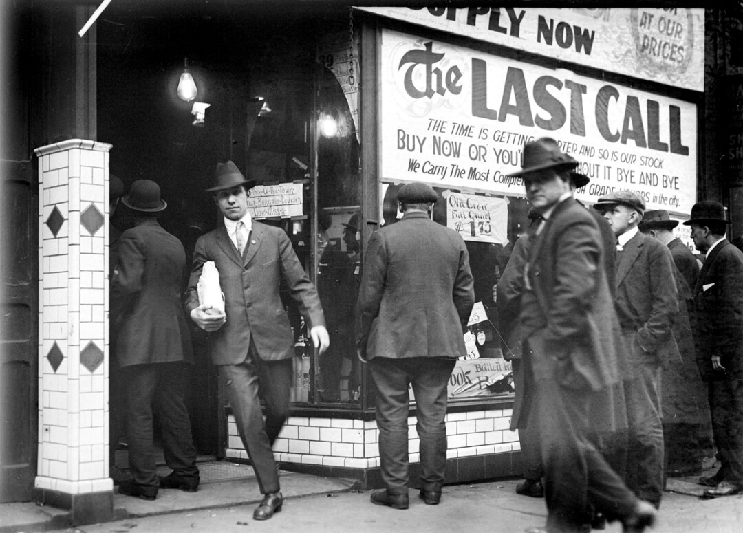 One last call for alcohol, so finish your whiskey or beer. Business was brisk at a Detroit liquor store on the eve of Prohibition in 1919.