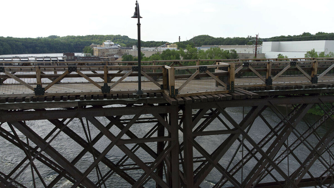 Damage to one of the bridge’s stone piers caused the deck to buckle. (Photo by Bryan Pederson)
