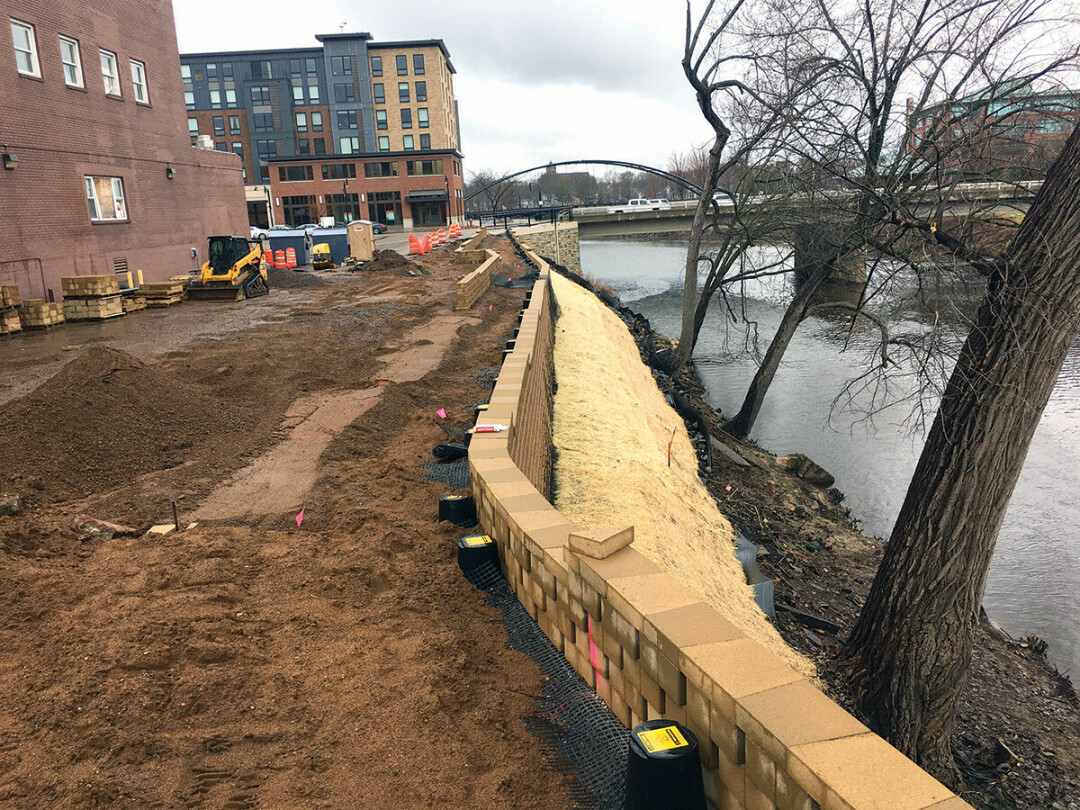 DON'T WORRY, IT WILL BE PAVED. This new trail segment runs along the south bank of the Eau Claire River between South Barstow and South Farwell streets.