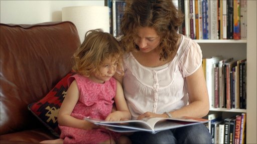 A REAL PAGE-TURNER. Reading to your children can make them smarter – and more adorable.