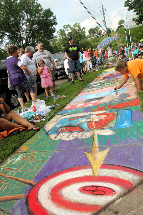 CHALKING UP ANOTHER YEAR. Nearly 150 artists and thousands of connoisseurs of concrete art descended on Wilson Park in downtown Eau Claire on Saturday, Aug. 2, for Volume One’s annual Chalkfest. Check out VolumeOne.org for a list of winners and a full photo gallery.