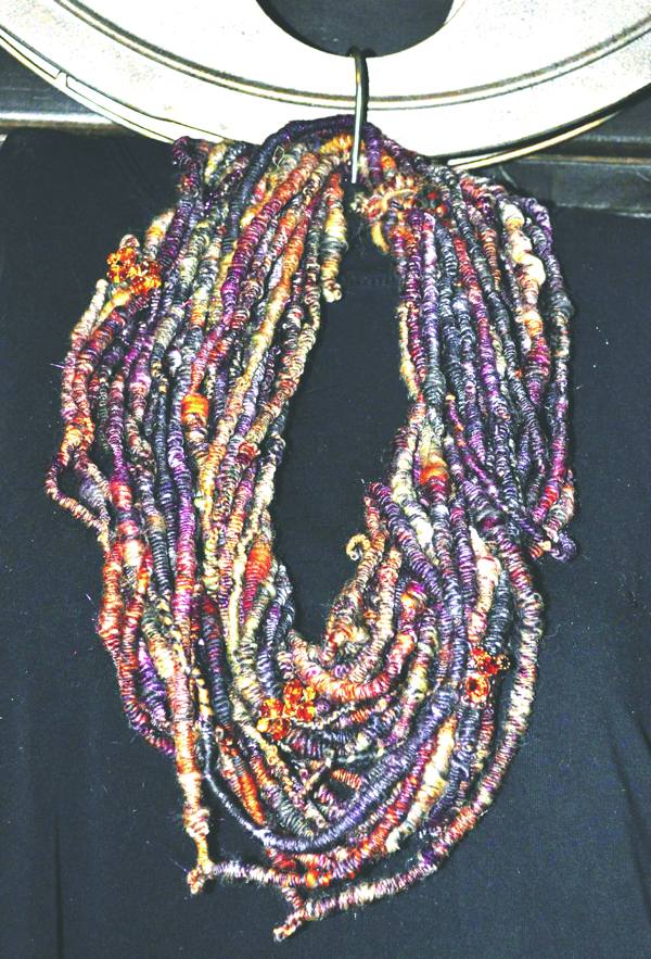 PRIZE PACKAGE. You can win this jeweled infinity scarf hand-spun by Lisa Murray of Ruby Slippers Studio, one of 24 items to be given away to visitors as part of the Yellowstone Art Trail Sept. 19-20.