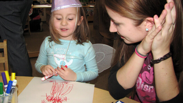 -Stout student Megan Richardson works with Eleanor during the brainstorming session.