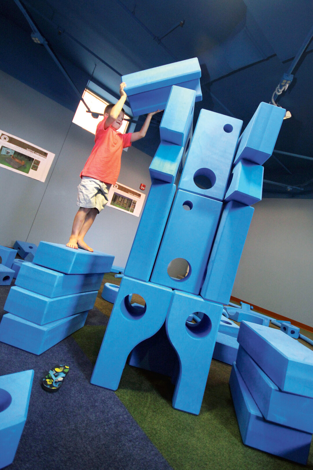 THE IMAGINATION PLAYGROUND AT THE CHILDREN’S MUSEUM OF EAU CLAIRE – A SET OF OVERSIZED BLOCKS – IS GREAT FOR IMAGINATIVE PLAY.