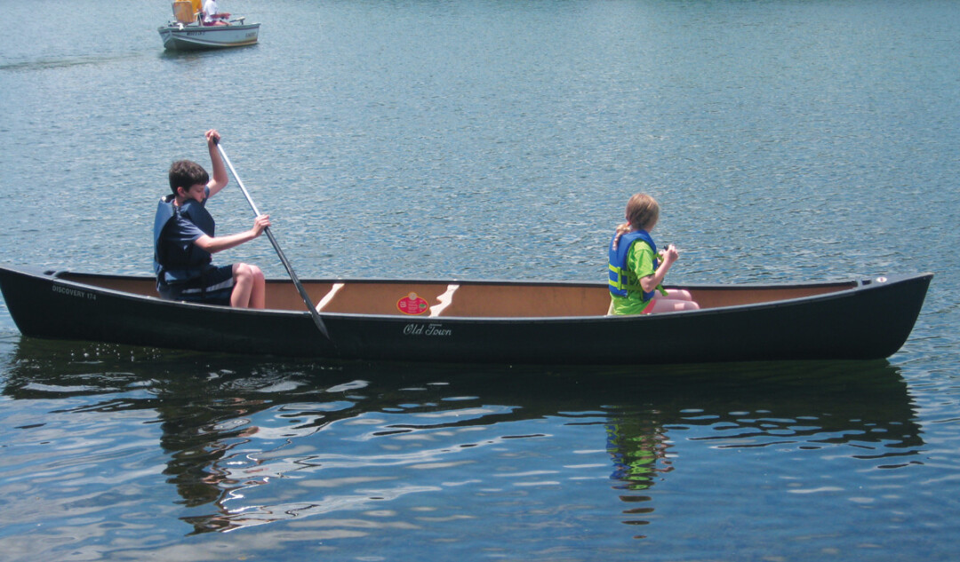 A GROUP GOES CANOEING AS PART OF EAU CLAIRE PARKS AND RECREATION’S OUTDOOR ADVENTURES PROGRAM, WHICH JUST WON A SILVER STAR OF EXCELLENCE FROM THE WISCONSIN PARKS AND REC ASSOCIATION.