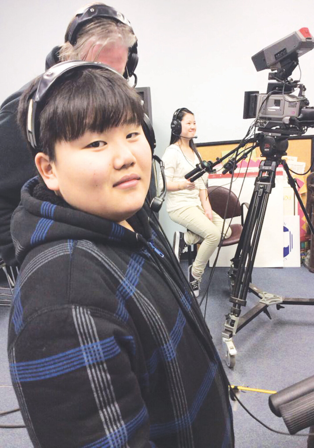 THE BUILDING BRIDGES FOR YOUTH PROGRAM PROVIDES MENTORING AND ACTIVITIES FOR HMONG YOUNG PEOPLE, SUCH AS PRODUCING A COOKING SHOW ON CHIPPEWA VALLEY COMMUNITY TELEVISION.
