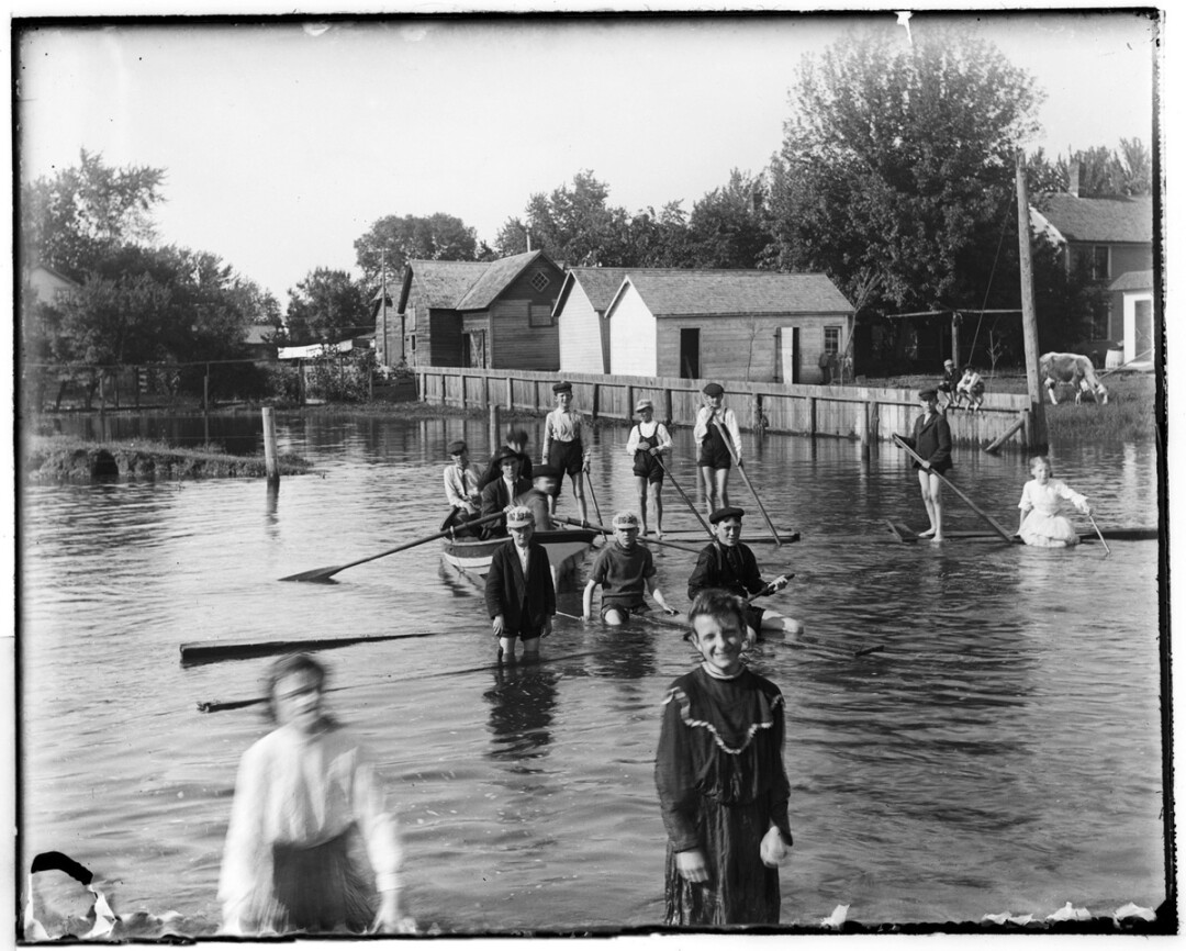 Among the photographs displayed in the exhibit Through Daniel’s Eyes are the June 1905 image of children playing in floodwater