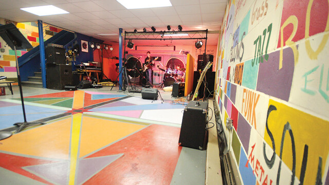 EVERY KID’S BASEMENT SHOULD HAVE ITS OWN STAGE. Altoona’s Phish Haus youth arts center includes an array of instruments and recording equipment.