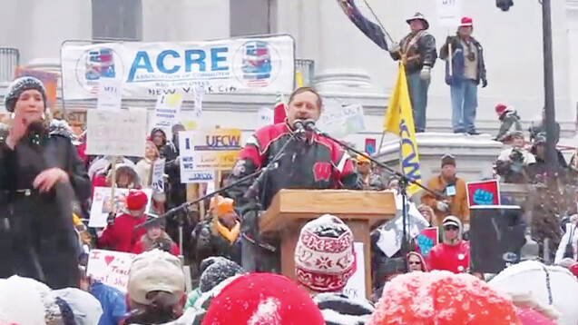 Eau Claire School District Superintendent Dr. Ron Heilmann speaks at a rally in front of a reported 75,000+ people in Madison, WI on February 26, 2011. 