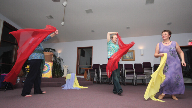 Ecstatic dancing at a monthly Ecstatic Dance meeting.
