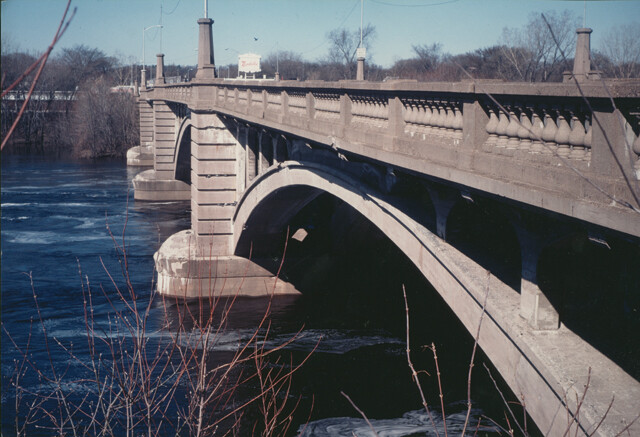 The Madison Bridge in its final days, 1986.  Notice the fancy stone work including turrets.