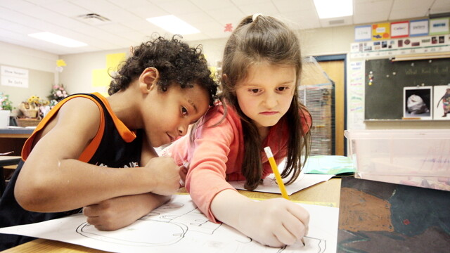 Longfellow Elementary students draw in art class, an opportunity some argue also provides the fine motor skill training of cursive writing.