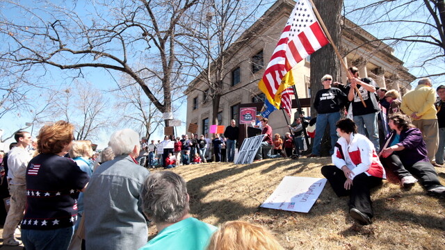 A Tea Party rally in Eau Claire. Two local brothers, Jeremy and Jason Kadinger, toured with the Tea Party Express for over 20,000 miles this last year.
