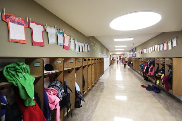 The hallway at Roosevelt Elementary School this year. The school is still able to put student work up, but without paper backing that used to line the hallway.