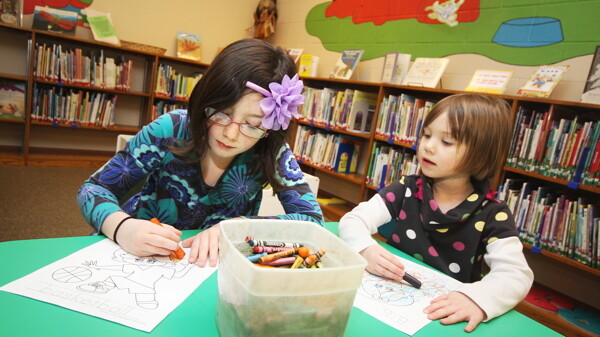 ORANGE YOU GOING TO COLOR THAT PART? The Fall Creek Public Library may be relatively small, but its schedule features a host of creative programs for little readers.