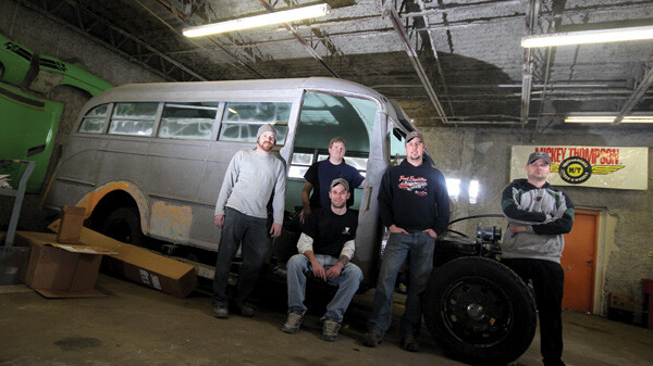 The crew at Fast Freddie’s Rod Shop, helmed by Fred Kappus (second from right) pose with the Elk Mound School Bus in its current form.