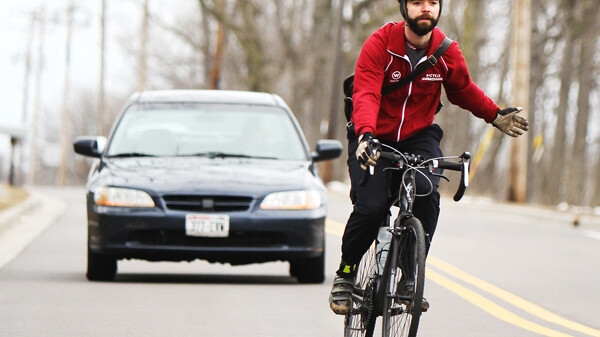 KEEP THE SIGNAL STRONG. Matt Andrews, western region director for the Bicycle Federation of Wisconsin, is helping organize local events for Bike to Work Week, May 13-17.