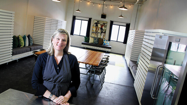 Forage founder Trish Cummins sits in the shared-use community kitchen’s main room – 1,000-square feet housing cooking facilities and a dining/workshop area. Located in Banbury Place, the space is offered to local producers looking for a centralized base, and to would-be restauranteurs needing a place to test their ideas.