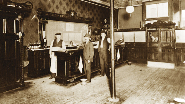 Alphonse Couture stands behind the bar at Between the Acts Saloon in the early 1900s. The saloon, one of several owned by members of the Couture family (including what’s now The Grand Illusion) likely was at 410 S. Barstow St. (now part of Valleybrook Church).