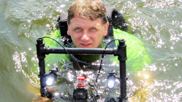 ABOVE: A WET CRYPTOZOOLOGIST. Author Chad Lewis during a monster-hunting mission to Lake Pepin. 