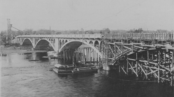 The previous Water Street bridge under construction in 1914.