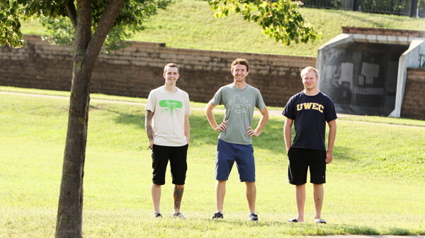 VISIONS OF HALFPIPES. A group of local skateboard enthusiasts, including (from left) Christopher Johnson, Gabe Brummett, and Kyle Gostomski, hope to build a skatepark in Boyd Park.