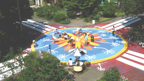 PORTLAND, OF COURSE. Portland, Oregon, has tried similar street murals at several intersections.