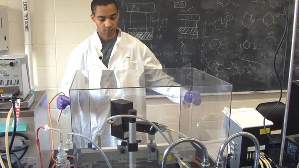 LAB COAT? CHECK. PURPLE GLOVES? CHECK. MAD SCIENCE SKILLS? CHECK. Tayo Sanders II became only the second Rhodes Scholar in UW-Eau Claire history in November.