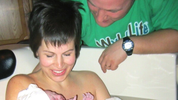 Amanda and Tim Gunderson after the birth of their daughter, Tahlia