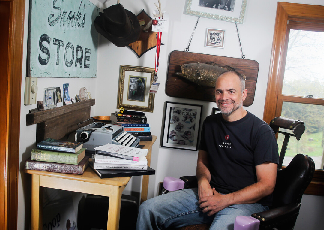 WHERE THE MAGIC HAPPENS. Michael Perry in his workspace. Photo by Andrea Paulseth