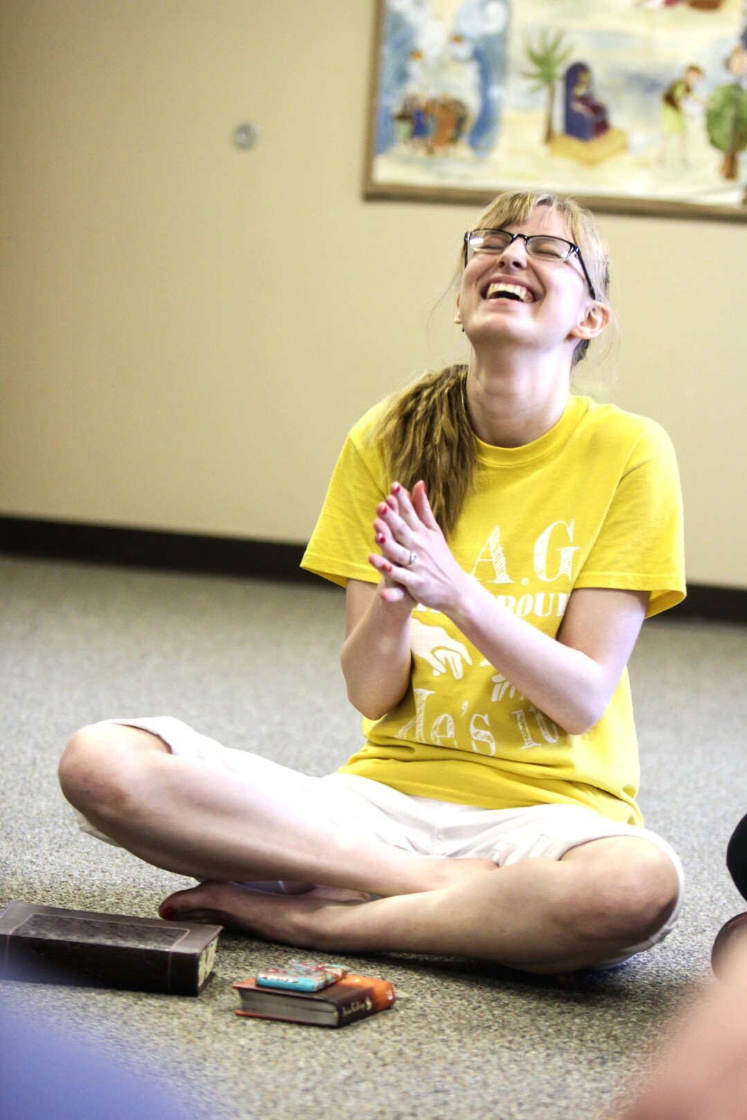 ACTING UP. Alynzia Fenske (above) is the self-described “organizer <br>and head dreamer” for TAG Skit Group (shown in rehearsal at <br>Peace Church in Eau Claire), a Christian teen theater troupe now <br>producing its first full-length play.
