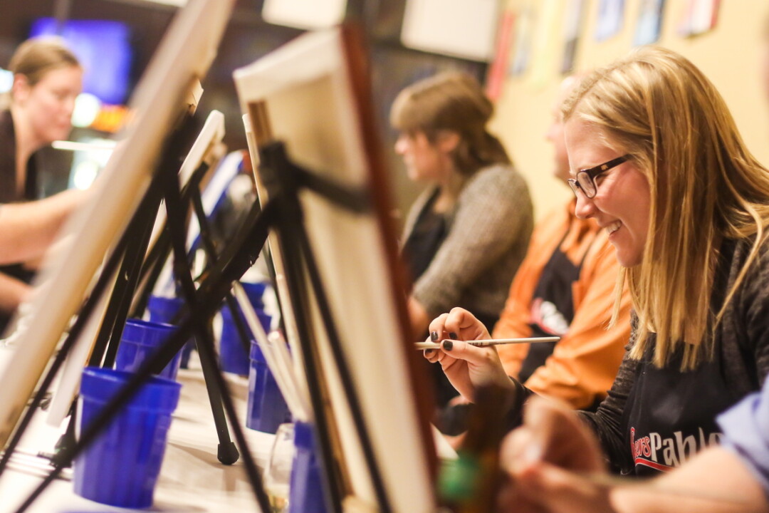 PLEASING TO THE PALETTE. Amateur artists get their paint on at Cheers Pablo in Eau Claire.