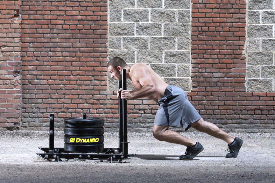 AMONG DYNAMIC’S PRODUCTS ARE POWER SLEDS, WHICH ATHLETES USE TO IMPROVE THEIR LEG, HIP, AND CORE STRENGTH