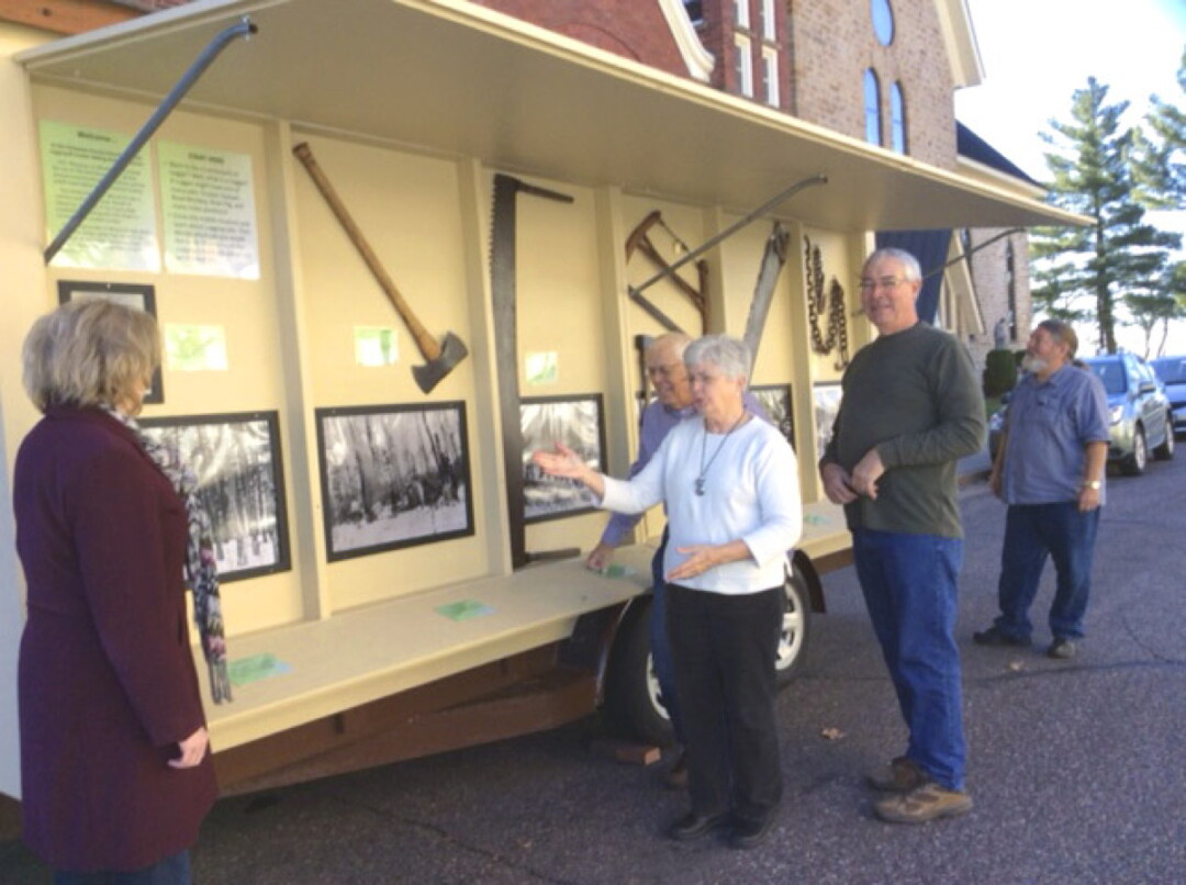 FEEL FREE TO AX QUESTIONS. The Chippewa County Historical Society’s new Mobile Lumberjack Museum.