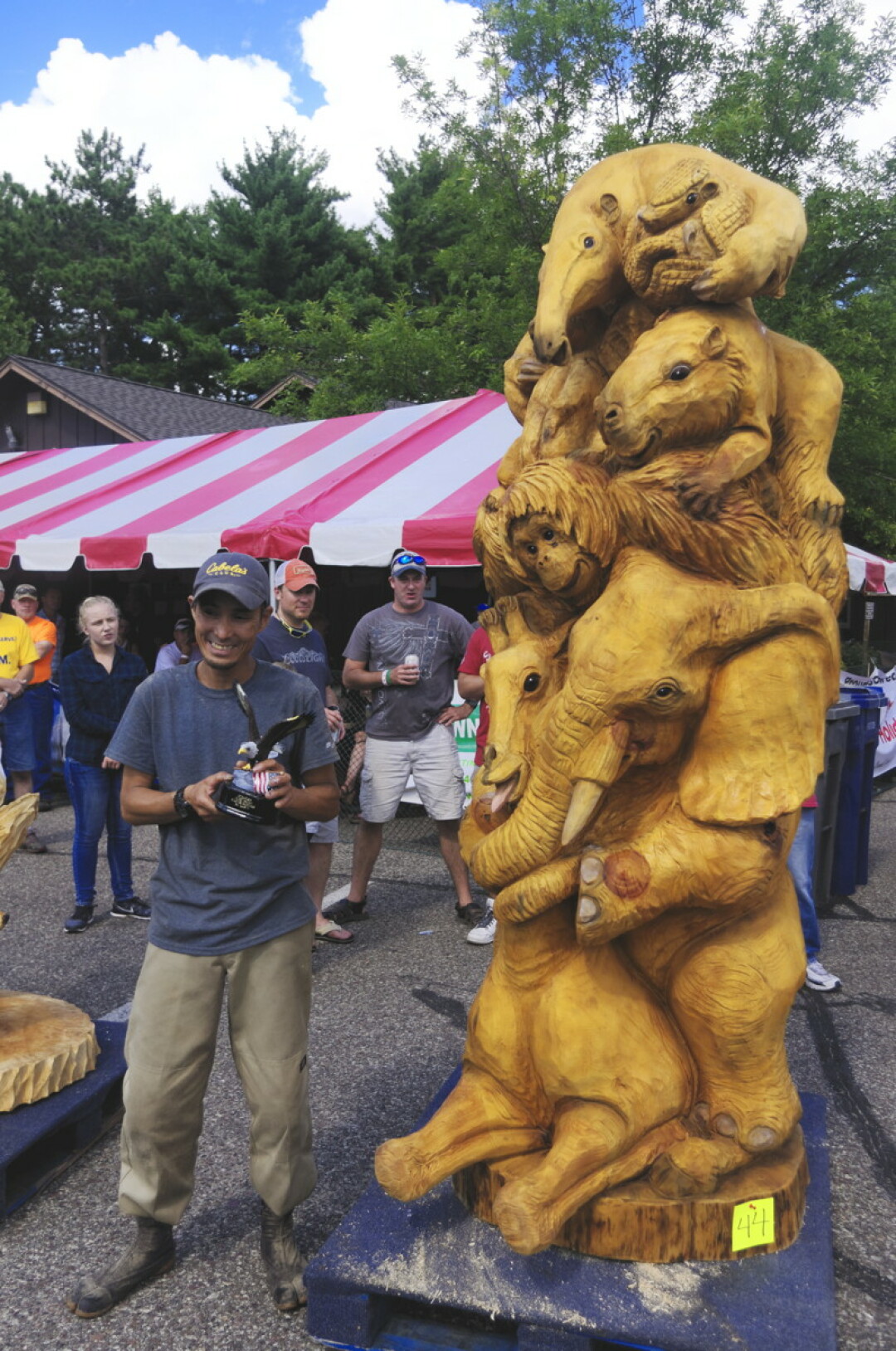 HOW MUCH WOOD COULD A CHAINSAW SAW? Takao Hayashi of Japan won first place at the U.S. Open Chainsaw Sculpture Championship in Eau Claire’s Carson Park, Aug. 4-7.