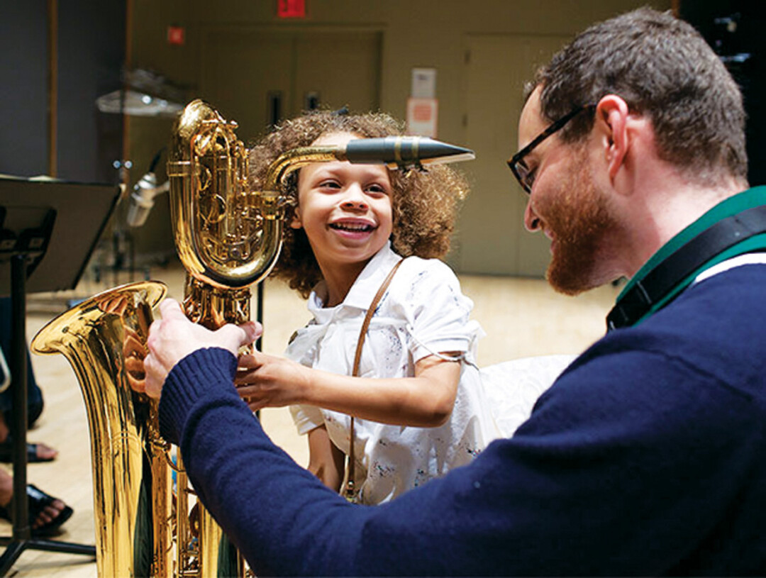 THIS IS HOW WEBOP. Jazz musician and Eau Claire Memorial grad Tim Sullivan facillitates a New York-based early childhood jazz class called WeBop, which gets kids as young as eight months old learning the basics of jazz. Image: Tim Sullivan