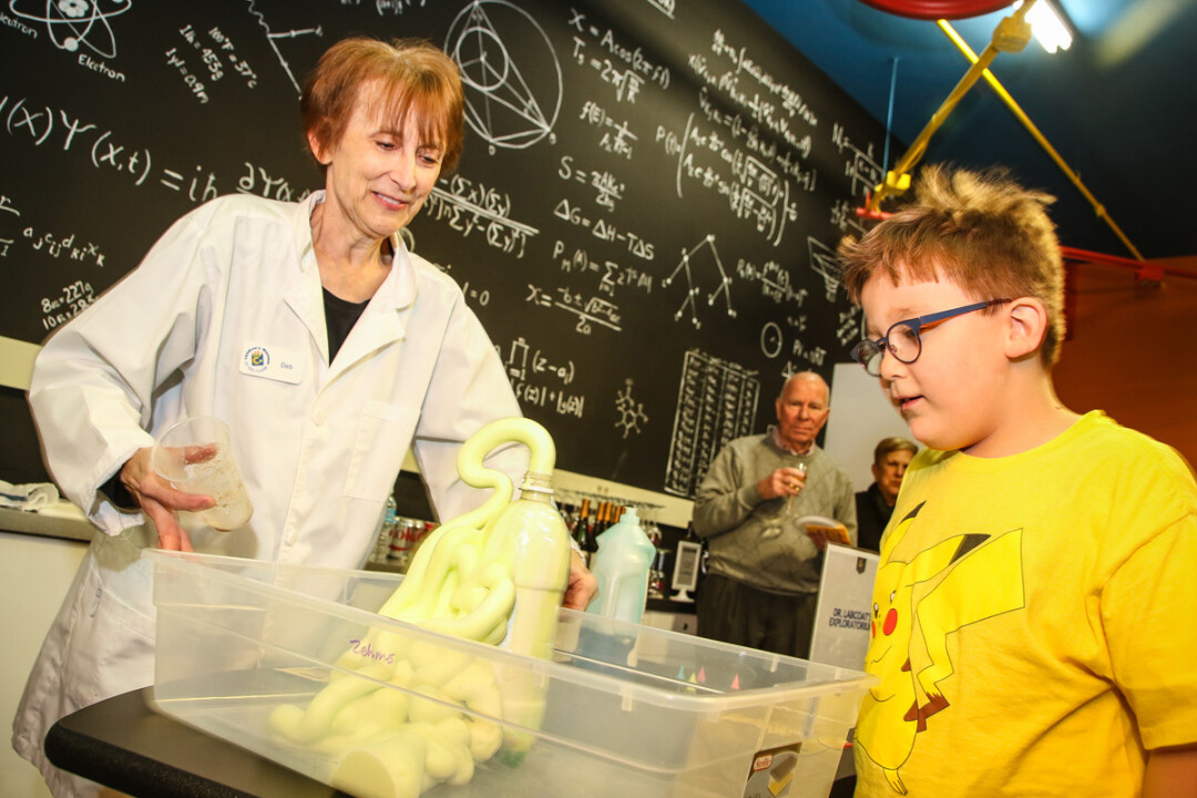SINK YOUR TEETH INTO SCIENCE. Jacob Shih, age 7, watches Dr. Labcoat make “elephant toothpaste” at The Failsafe Fab Lab in the Children’s Museum of Eau Claire.