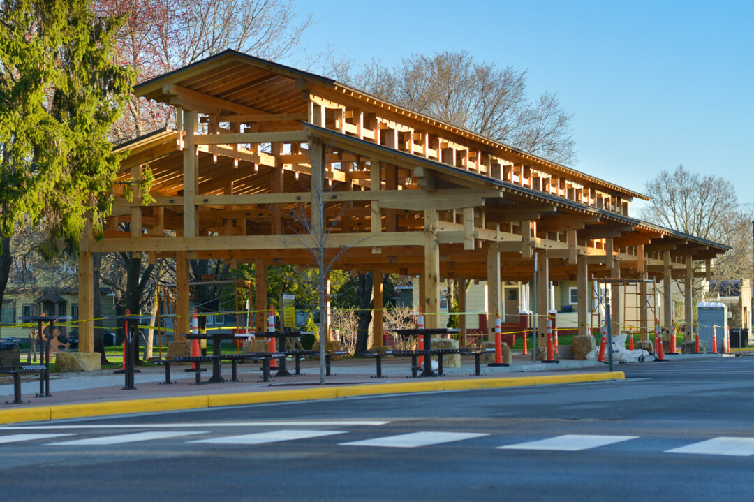 Wallace headed up the new timber frame pavilion project (right) for the Menomonie Farmers Market. Image: Timothy Mather