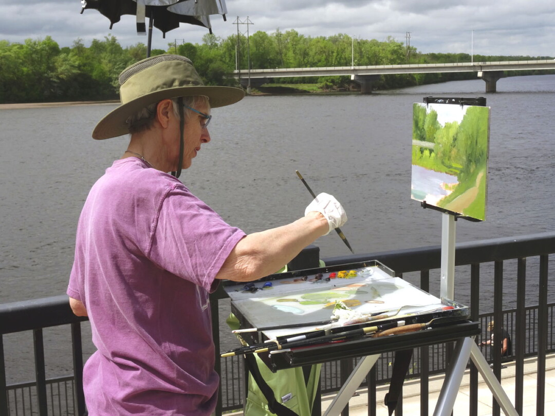 AIR BRUSHING. A participant in a previous year’s GO Paint! plein air event captured the scenery along the Chippewa River near Durand. This year’s event encompasses more of the Chippewa Valley.